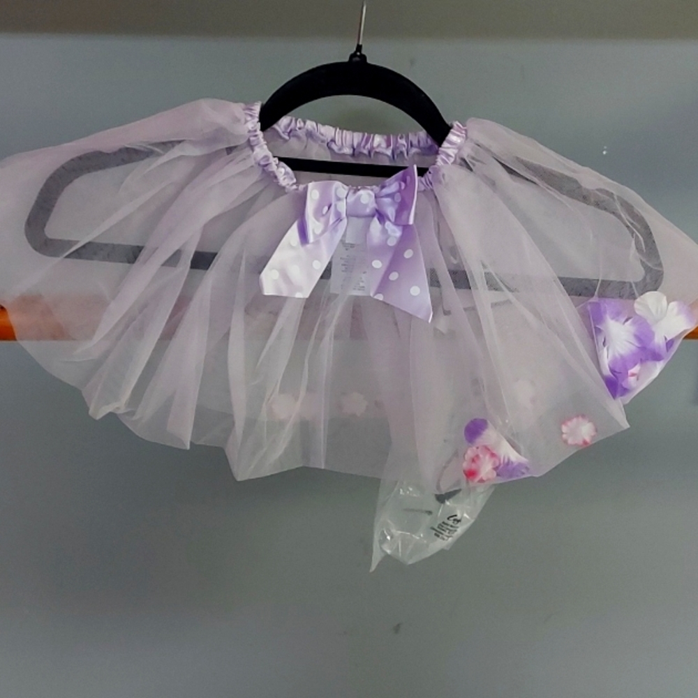 Purple w/flowers small childs dance skirt from Signature Collection by Capezio